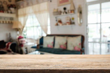 Empty wooden table space platform and blurred restaurant or coffee shop background for product display montage.