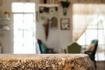 Empty wooden table space platform and blurred restaurant or coffee shop background for product display montage.