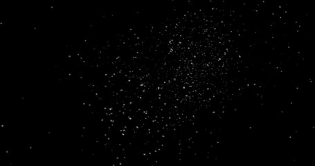 abstract Flying dust particles on a black background