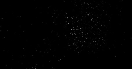 abstract Flying dust particles on a black background