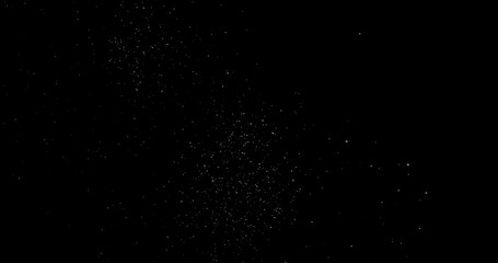 abstract Flying dust particles on a black background