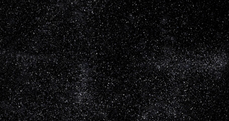 abstract Flying dust particles on a black background