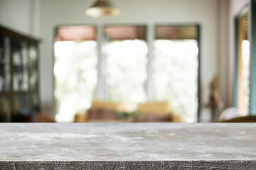 Empty wooden desk space platform over blurred restaurant or coffee shop background for product display montage.