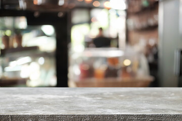 Empty wooden desk space platform over blurred restaurant or coffee shop background for product display montage.