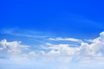 White cumulus clouds clear blue sky background, beautiful aerial cloudscape view from above, high azure skies backdrop, fluffy cloud texture, sunny heaven, cloudy weather, flight landscape, copy space