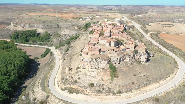 aerial view over Rello village (flying around a POI), province of Soria, Castilla y Leon, Spain