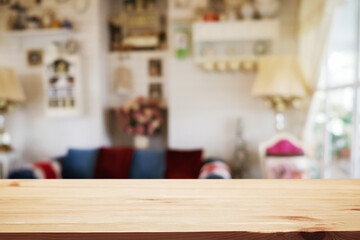 Empty wooden table space platform and blurred resturant or coffee shop background for product display montage.