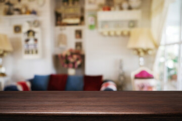 Empty wooden table space platform and blurred resturant or coffee shop background for product display montage.