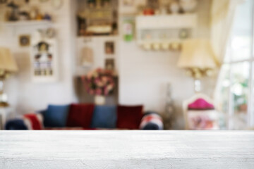 Empty wooden table space platform and blurred resturant or coffee shop background for product display montage.