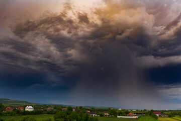 Obraz na płótnie Canvas Summer storm over the fields.