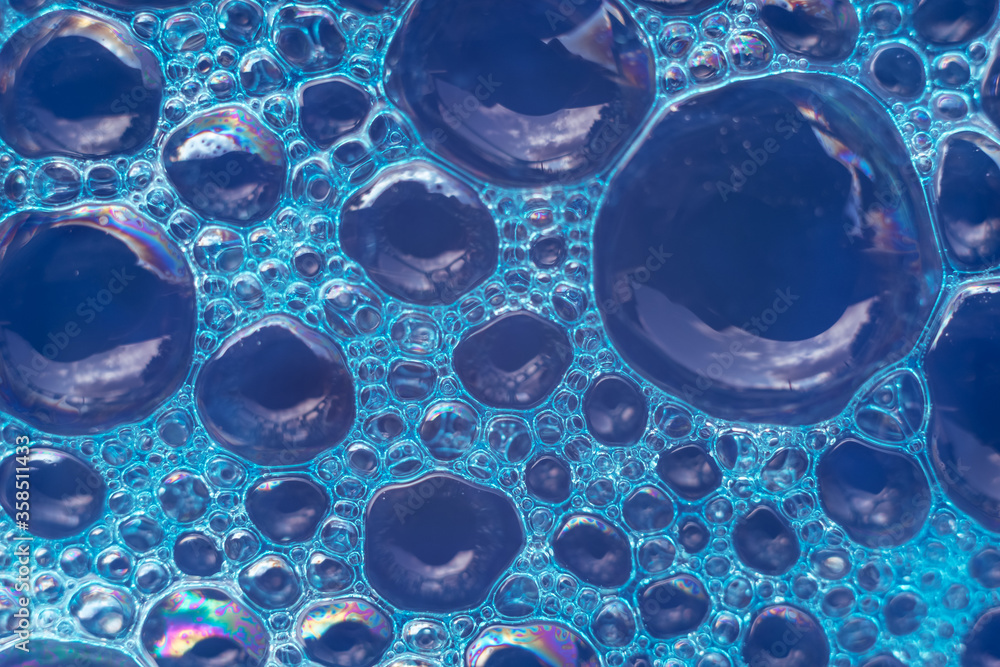 Poster beautiful abstract blue bubbles background pattern texture for design . macro view.