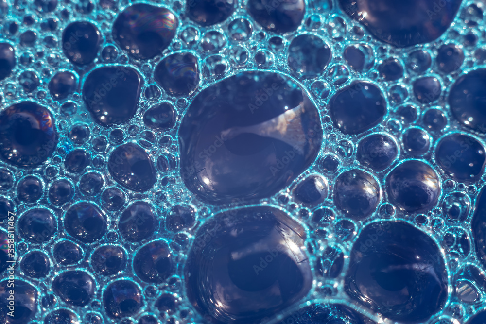 Poster Beautiful abstract blue bubbles background pattern texture for design . Macro view.