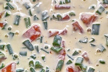 Prepare tasty piece of tarta pastry with salmon, chive and basilia.