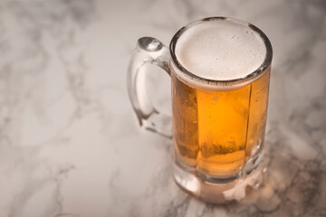 Cold beer concept on marble floor