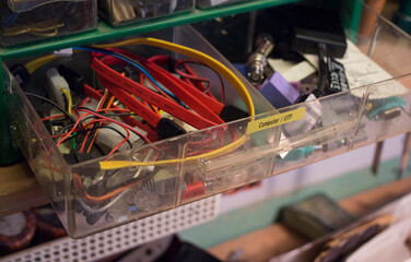 Computer cables and connectors stored in a drawer for spare or diy rapair.