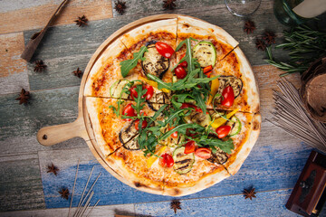 Appetizing italian pizza with eggplant squash