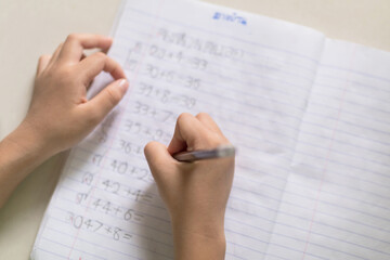 Obraz premium Asia little boy studying from home during the epidemic KOVID-19 