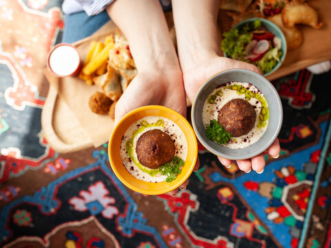 kibbeh traditional Lebanese cuisine food. Fried Burghul and meat balls. kibbeh in sauce. Top view