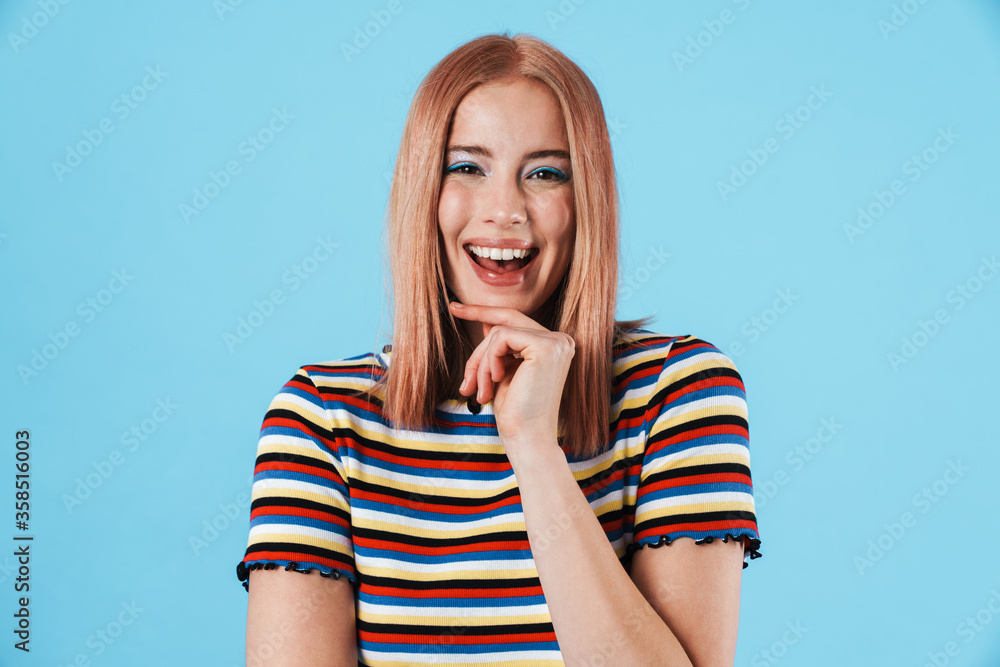 Canvas Prints Image of young joyful woman laughing and looking at camera