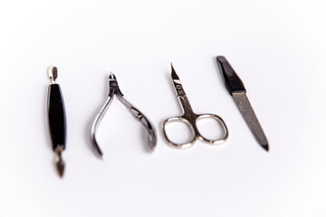 Tools of a manicure set on a white background