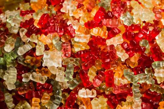 A bunch of colorful jelly bears candies. Colourful sweet background