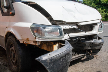 Obraz na płótnie Canvas Crashed Ford transit van front bumper