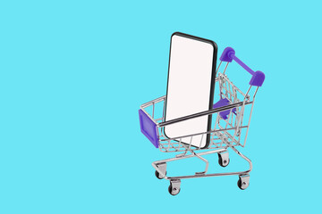 shopping cart with smartphone on blue background, online shopping concept.