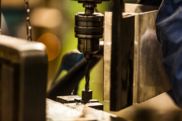 drill press with tip on metal