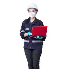 Female industrial engineer in the hard hat wearing protective face mask and glove  to protect against Covid-19 uses laptop computer while  standing determined on white background with clipping path.