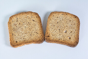 Two slices of brown bread