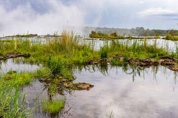 It's Landscape of the Zambezi river and Livingstone Island, named after the Scottish explorer David Livingstone