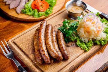 fried sausage with sauerkraut and mustard sauce