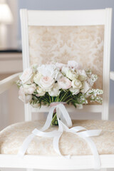 beautiful fresh wedding bouquet close up in room interior