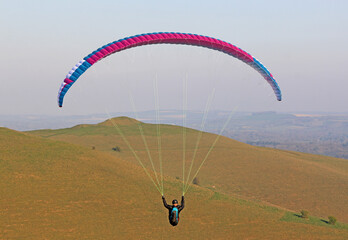 Paraglider flying wing at Milk Hill	