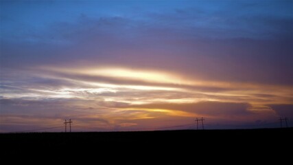 wind turbines at sunset