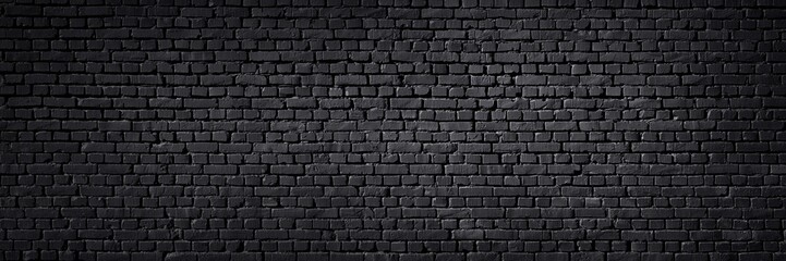Texture of a black painted brick wall as a background or wallpaper - 358541214