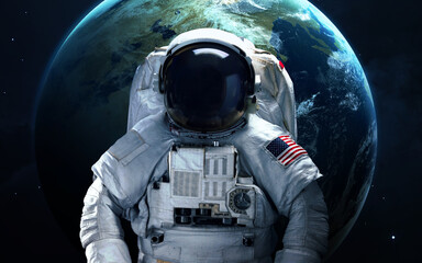 Astronaut with the Earth behind © Vadimsadovski