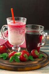 Sweet strawberry and healthy, wholesome food in composition on the table.