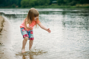 Girl playing in the water