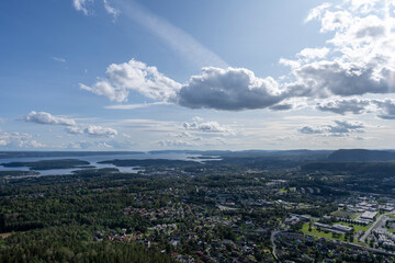 Fototapeta premium Clouds over the city. Kolsastoppen, Oslo.