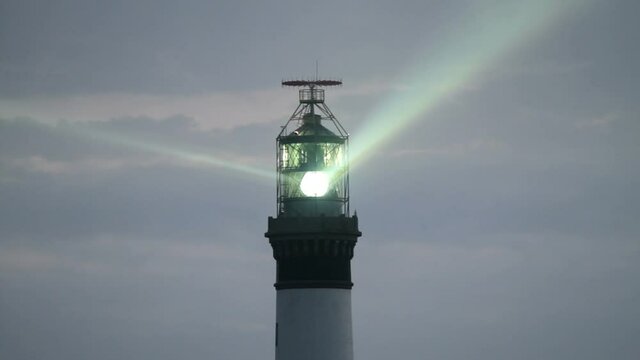 Creac'h powerful lighthouse in Ushant island at dusk, brittany, France