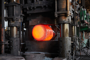 Press-Forging Shop. Forging a hot metal ingot.
