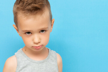Naklejka premium Portrait of little boy with expression on his face with sad and upset