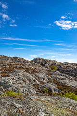 Swedish seascape in summertime. Rocks and blue sky