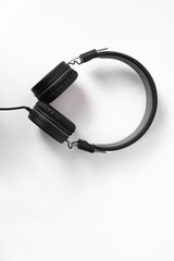 Fototapeta premium earphones are extremely convenient to use black for tablet pc mobile phone computer