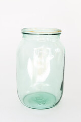 empty glass jar on a white background