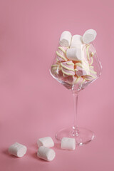 pink and white marshmallows on glass