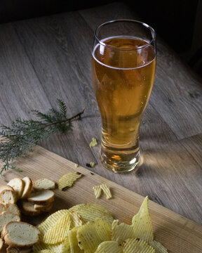 glass of cider and snacks