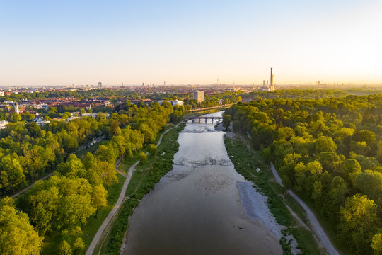 Munich city behind river in a misty morning aerial drone image 