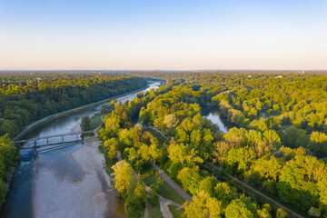 Isar at Flaucher in Munich in summer morning from above, aerial drone shot